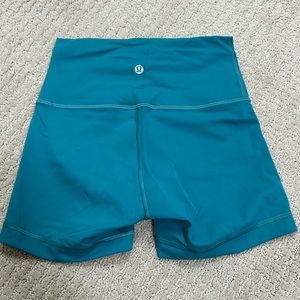 Wunder Train High-Rise Biker Shorts 4” inseam